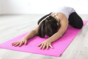 Woman doing yoga at home