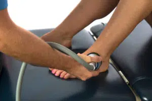 Shockwave Therapy on the ankle.