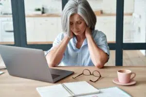 Elderly woman having pain from fibromyalgia