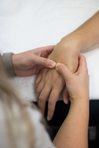 Patient with carpal tunnel being examined by a doctor