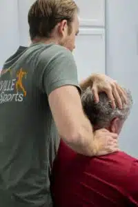 Patient at Knoxville Spine and Sports getting neck pain treatment