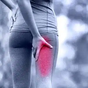 woman suffering from leg pain