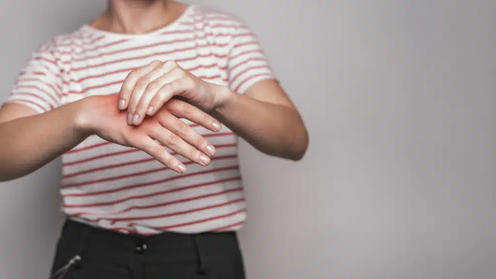 a woman experiencing bursitis